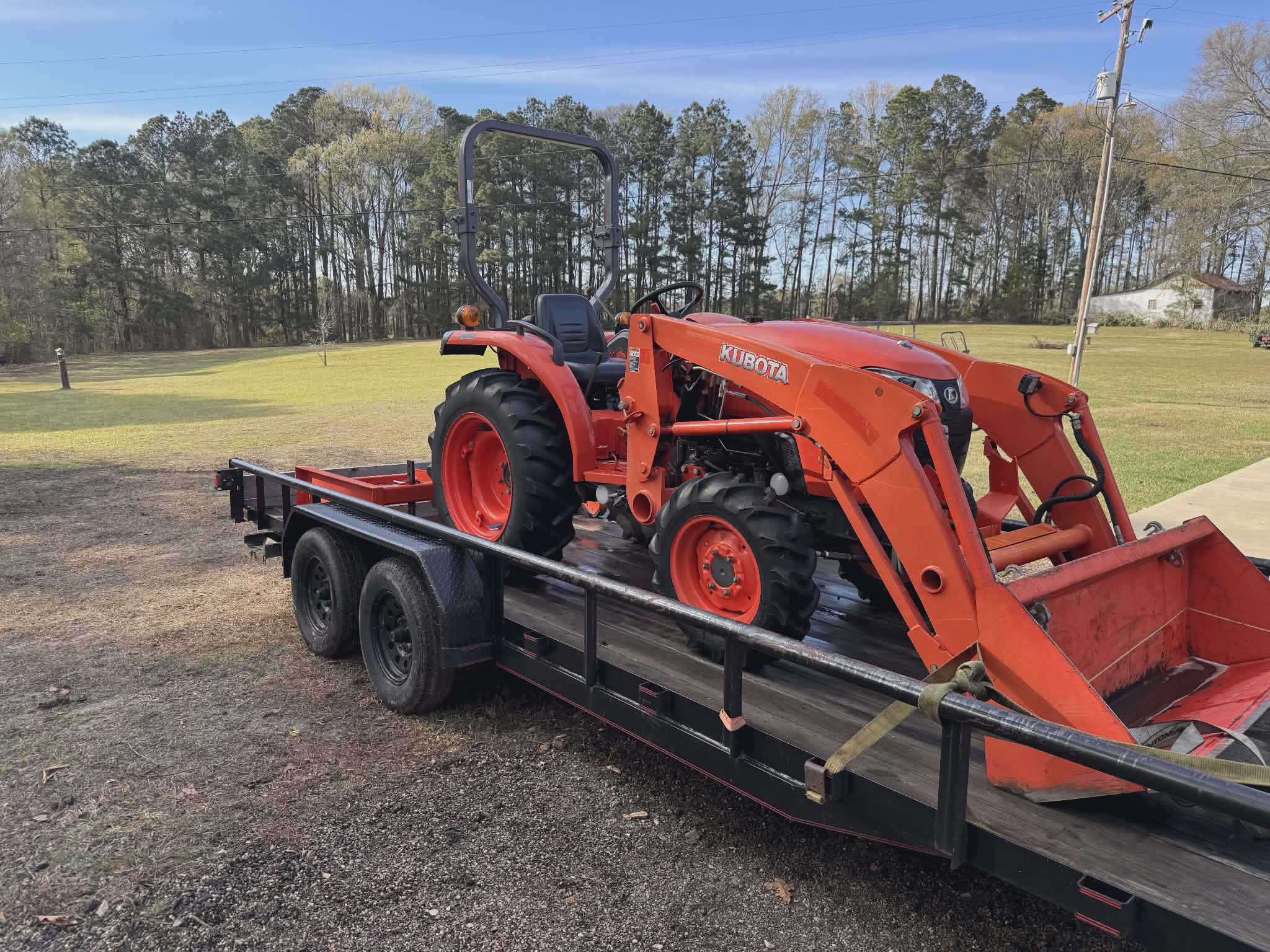 Shane's tractor for bush hogging, driveway repair, and tilling